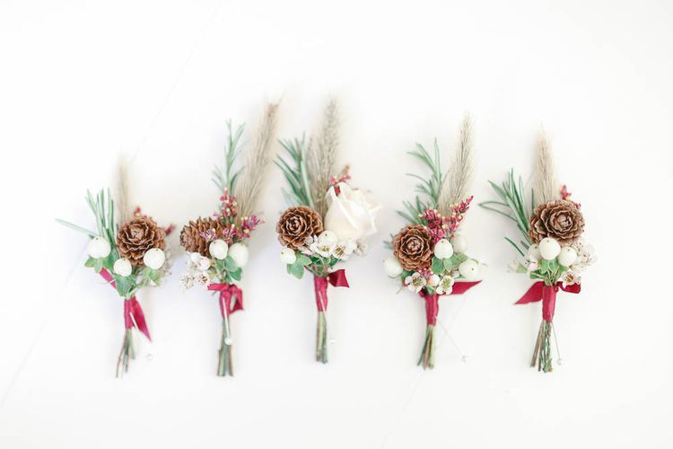Winter Buttonholes | Red New Years Eve Winter Wedding at Iscoyd Park, Shropshire | White Stag Wedding Photography | Lovetwofilm
