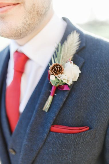 Winter Buttonhole | Red New Years Eve Winter Wedding at Iscoyd Park, Shropshire | White Stag Wedding Photography | Lovetwofilm