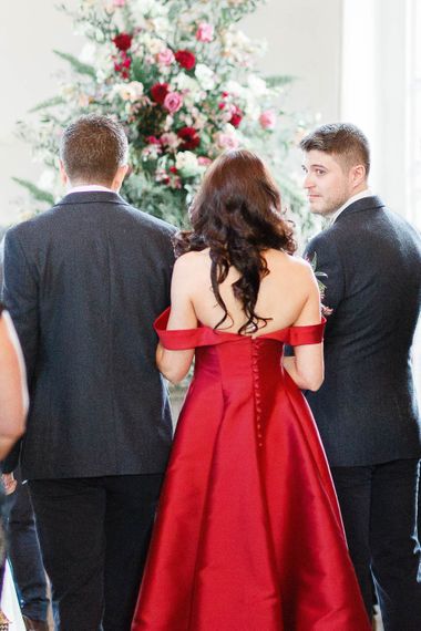 Wedding Ceremony | Bride in Bespoke Red Gown from agape Bridal Boutique | Groom in Slaters Suit | Red New Years Eve Winter Wedding at Iscoyd Park, Shropshire | White Stag Wedding Photography | Lovetwofilm