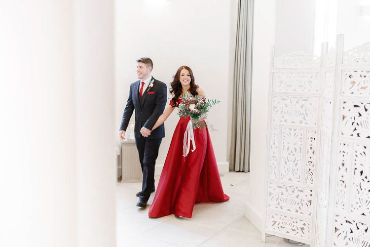 Bride in Bespoke Red Gown from agape Bridal Boutique | Groom in Slaters Suit | Red New Years Eve Winter Wedding at Iscoyd Park, Shropshire | White Stag Wedding Photography | Lovetwofilm