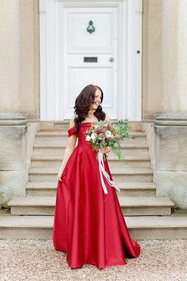 Bride in Bespoke Red Gown from agape Bridal Boutique | Red New Years Eve Winter Wedding at Iscoyd Park, Shropshire | White Stag Wedding Photography | Lovetwofilm