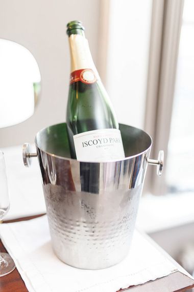 Champagne | Red New Years Eve Winter Wedding at Iscoyd Park, Shropshire | White Stag Wedding Photography | Lovetwofilm