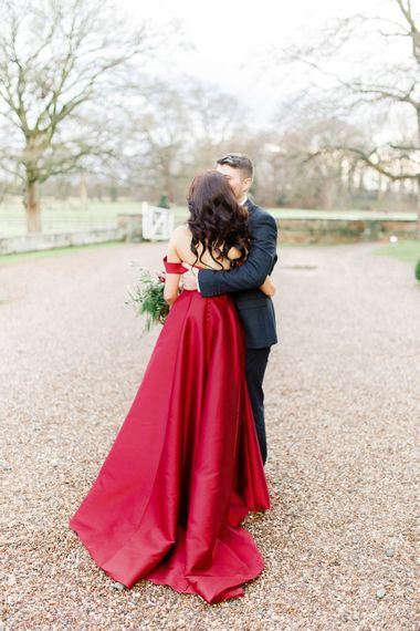 Bride in Bespoke Red Gown from agape Bridal Boutique | Groom in Slaters Suit | Red New Years Eve Winter Wedding at Iscoyd Park, Shropshire | White Stag Wedding Photography | Lovetwofilm