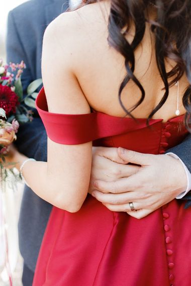Bride in Bespoke Red Gown from agape Bridal Boutique | Groom in Slaters Suit | Red New Years Eve Winter Wedding at Iscoyd Park, Shropshire | White Stag Wedding Photography | Lovetwofilm