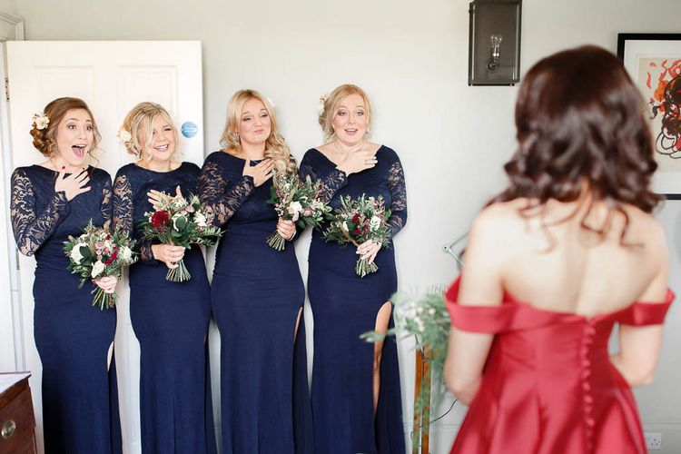 Bridal Party First Look | Bridesmaids in Navy Lace Dresses | Red New Years Eve Winter Wedding at Iscoyd Park, Shropshire | White Stag Wedding Photography | Lovetwofilm