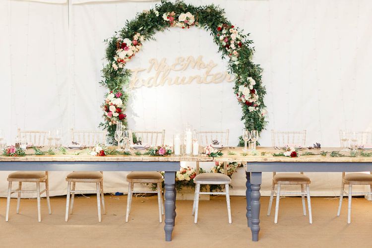 Floral Hoop Top Table Wedding Decor | Wedding Reception Decor | Red New Years Eve Winter Wedding at Iscoyd Park, Shropshire | White Stag Wedding Photography | Lovetwofilm