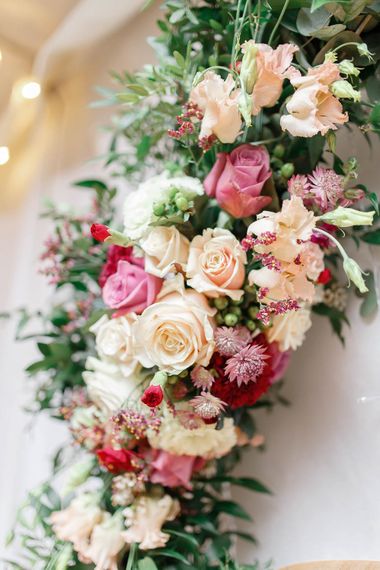 Red & Pink Wedding Flowers | Floral Hoop | Wedding Reception Decor | Red New Years Eve Winter Wedding at Iscoyd Park, Shropshire | White Stag Wedding Photography | Lovetwofilm