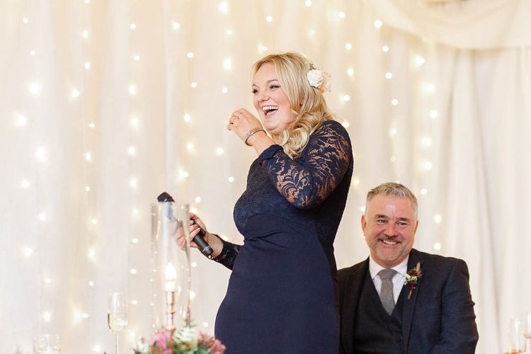 Wedding Reception Speeches | Bridesmaid in Navy Dress | Red New Years Eve Winter Wedding at Iscoyd Park, Shropshire | White Stag Wedding Photography | Lovetwofilm