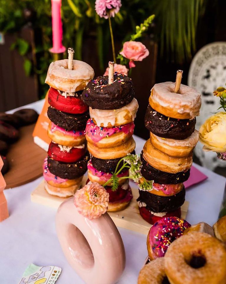 wedding dessert table with doughnuts