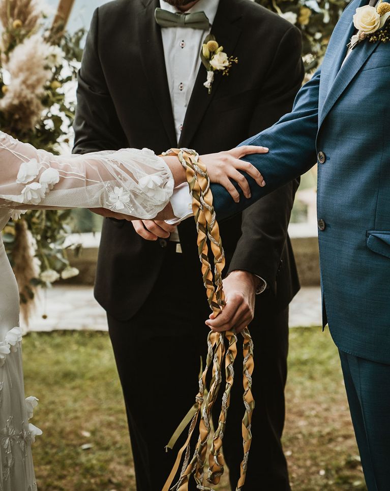 What is a Handfasting ceremony? We share everything you need to know, plus how to do it.
