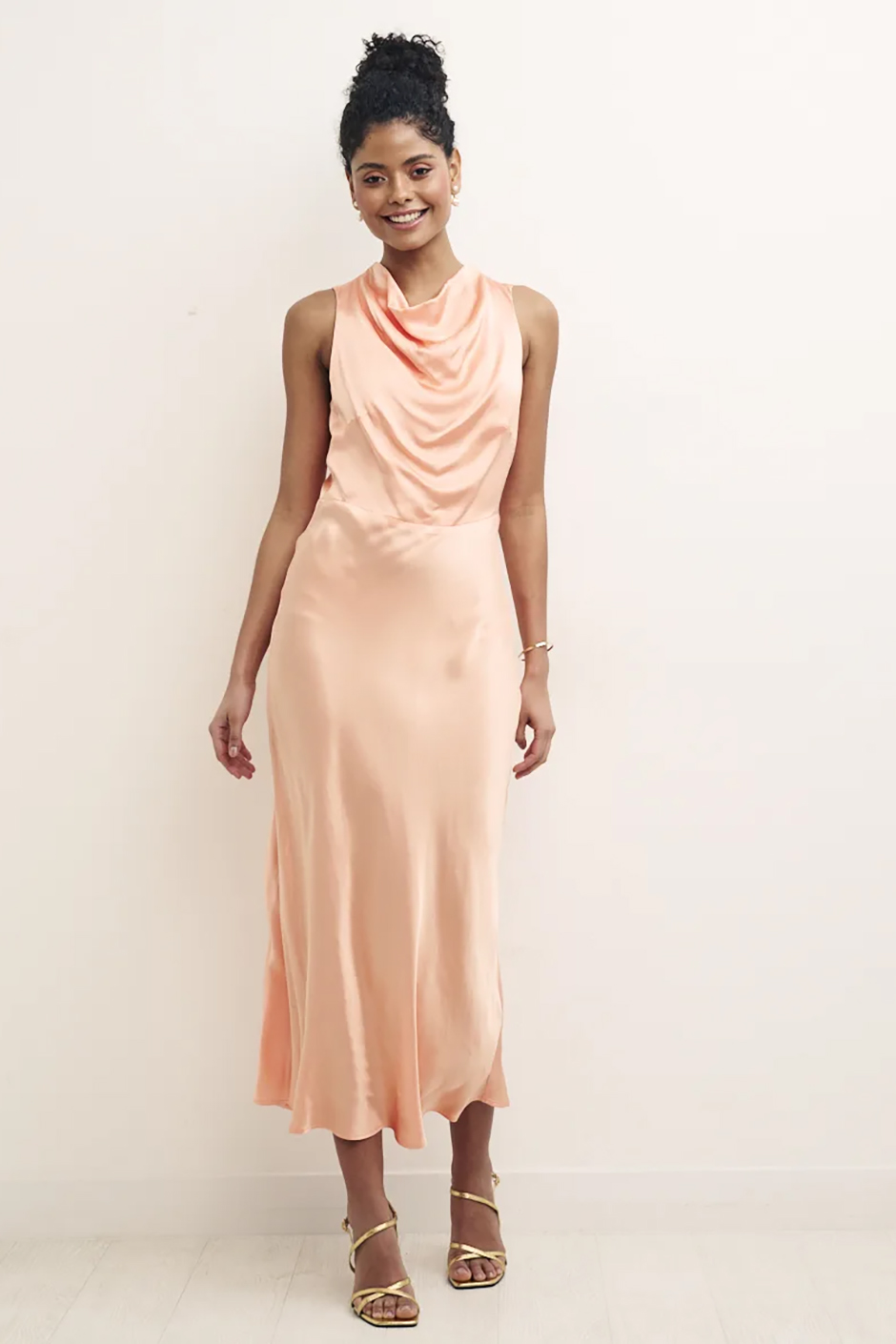 Peach satin bridesmaid dress with draped neckline from Nobody's Child