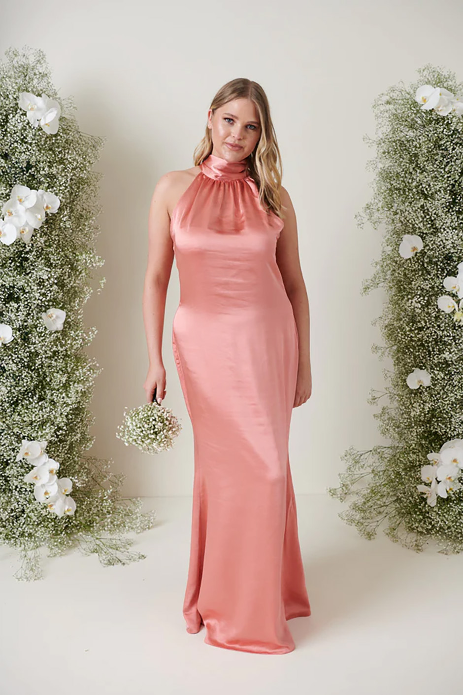 Spring bridesmaid dress from Pretty Lavish - pink/apricot satin maxi dress with halter tie neck 