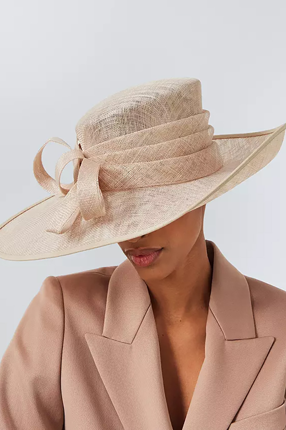 John Lewis wedding hat in natural pearl colour with decorative bow on the front