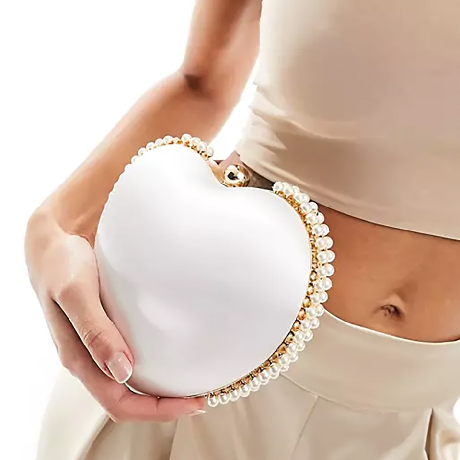 Heart shaped bridal clutch bag in white satin with pearl trim from True Decadence/ ASOS