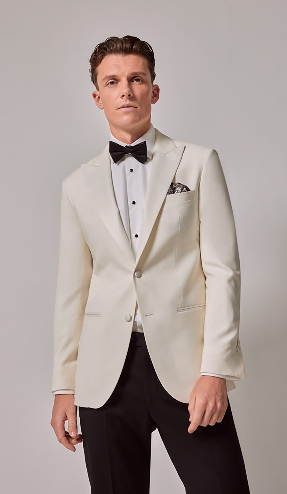 White groom suit from Hawes & Curtis 