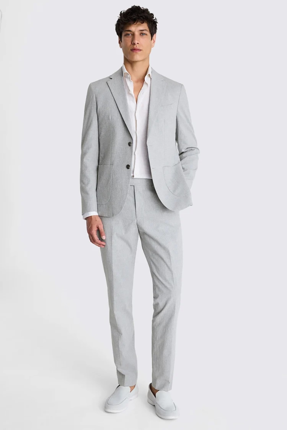 Slim fit grey groomsmen suit in a light grey marl tone for weddings 